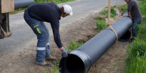 Everything You Need to Know about French Drainage Hauts-de-france/france-may,18,2018:,A,Large,Bore,Evacuation,Pipe,Being,Positioned